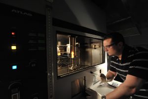 person using wood burning machine